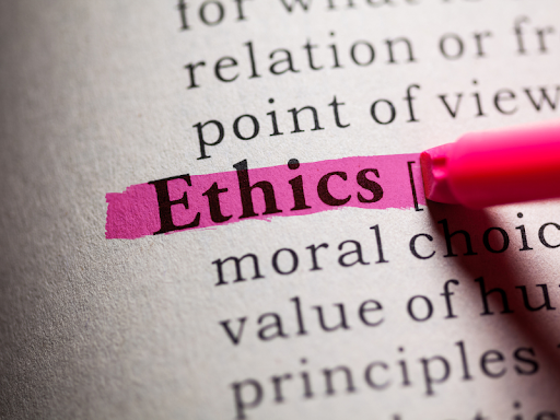 The word ethics being highlighted in a book showcasing how important ethics and transparency is to the legal team at ATAC Law