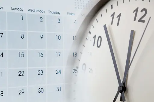 Clock and calendar meant to represent the timeline for an executor to settle an estate.