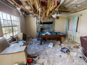 Inside a wrecked house after a building collapse caused during the underpinning process for a construction development. 
